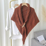 Triangular knitted scarf with leather buckle