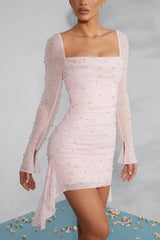 Long-sleeved mini-dress with decorated collar