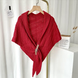 Triangular knitted scarf with leather buckle