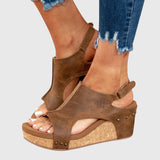 Women's suede orthopedic sandals with a comfortable wedge heel, open toe, and ergonomic insole