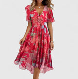 Women's floral midi dress with V-neck, short sleeves and flowing skirt, elegant and lightweight for summer