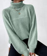 Warm knitted sweater with turtleneck for women