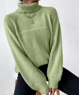 Warm knitted sweater with turtleneck for women