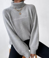 Warm knitted sweater with turtleneck for women