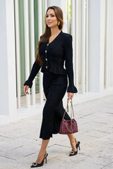 Women's fitted outfit with cardigan and midi skirt