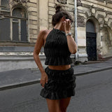 Women's two-piece pleated outfit with halter neck