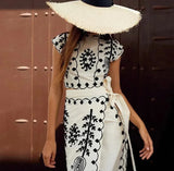 Women's sleeveless embroidered set with flowing skirt