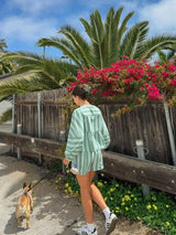 Women's summer outfit with green stripes: blouse and shorts
