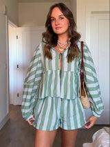 Women's summer outfit with green stripes: blouse and shorts