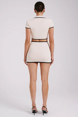 Women's white mini dress with black ribbed trim