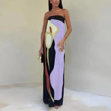 Women's strapless maxi dress with flowing abstract patterns