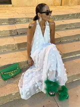 Women's halter neck maxi dress with light floral details