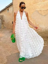 Women's halter neck maxi dress with light floral details