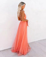 Women's long orange backless dress with thin straps