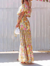Women's long off-the-shoulder dress with floral patterns