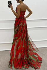 Women's long patterned evening dress with slit and straps