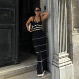 Long, fitted ecru dress with openwork details