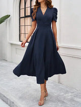 Women's midi dress with V-neck and puff sleeves