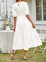 Textured women's midi dress with short sleeves and ruffles