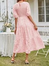Textured women's midi dress with short sleeves and ruffles