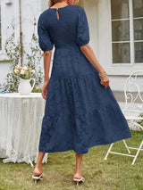 Textured women's midi dress with short sleeves and ruffles