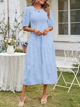 Textured women's midi dress with short sleeves and ruffles