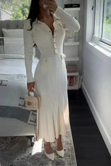 Elegant midi dress with buttons and long sleeves