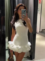 Women's short sleeveless dress with ruffled hem