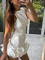 Women's short sleeveless dress with ruffled hem