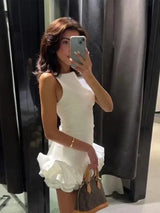 Women's short sleeveless dress with ruffled hem