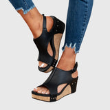 Women's suede orthopedic sandals with a comfortable wedge heel, open toe, and ergonomic insole