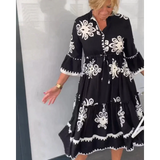 Autumn dress with floral print and elegant fit