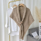 Triangular knitted scarf with leather buckle