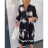 Autumn dress with floral print and elegant fit