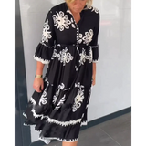 Autumn dress with floral print and elegant fit