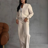Set with jacket with zipper and trousers with wide leg