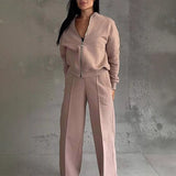 Set with jacket with zipper and trousers with wide leg
