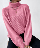 Warm knitted sweater with turtleneck for women