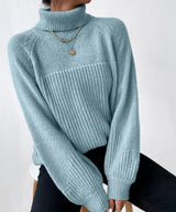 Warm knitted sweater with turtleneck for women