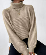 Warm knitted sweater with turtleneck for women