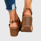 Women's suede orthopedic sandals with a comfortable wedge heel, open toe, and ergonomic insole