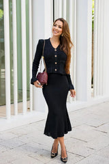 Women's fitted outfit with cardigan and midi skirt