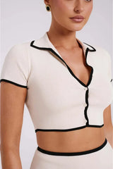 Women's white mini dress with black ribbed trim
