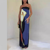 Women's strapless maxi dress with flowing abstract patterns