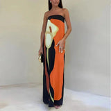 Women's strapless maxi dress with flowing abstract patterns