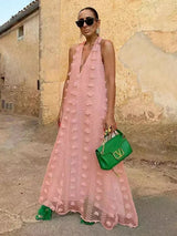 Women's halter neck maxi dress with light floral details