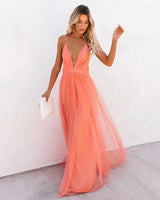Women's long orange backless dress with thin straps