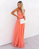 Women's long orange backless dress with thin straps