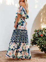 Women's long off-the-shoulder dress with floral patterns
