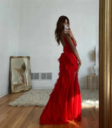 Women's long evening dress with straps and ruffles